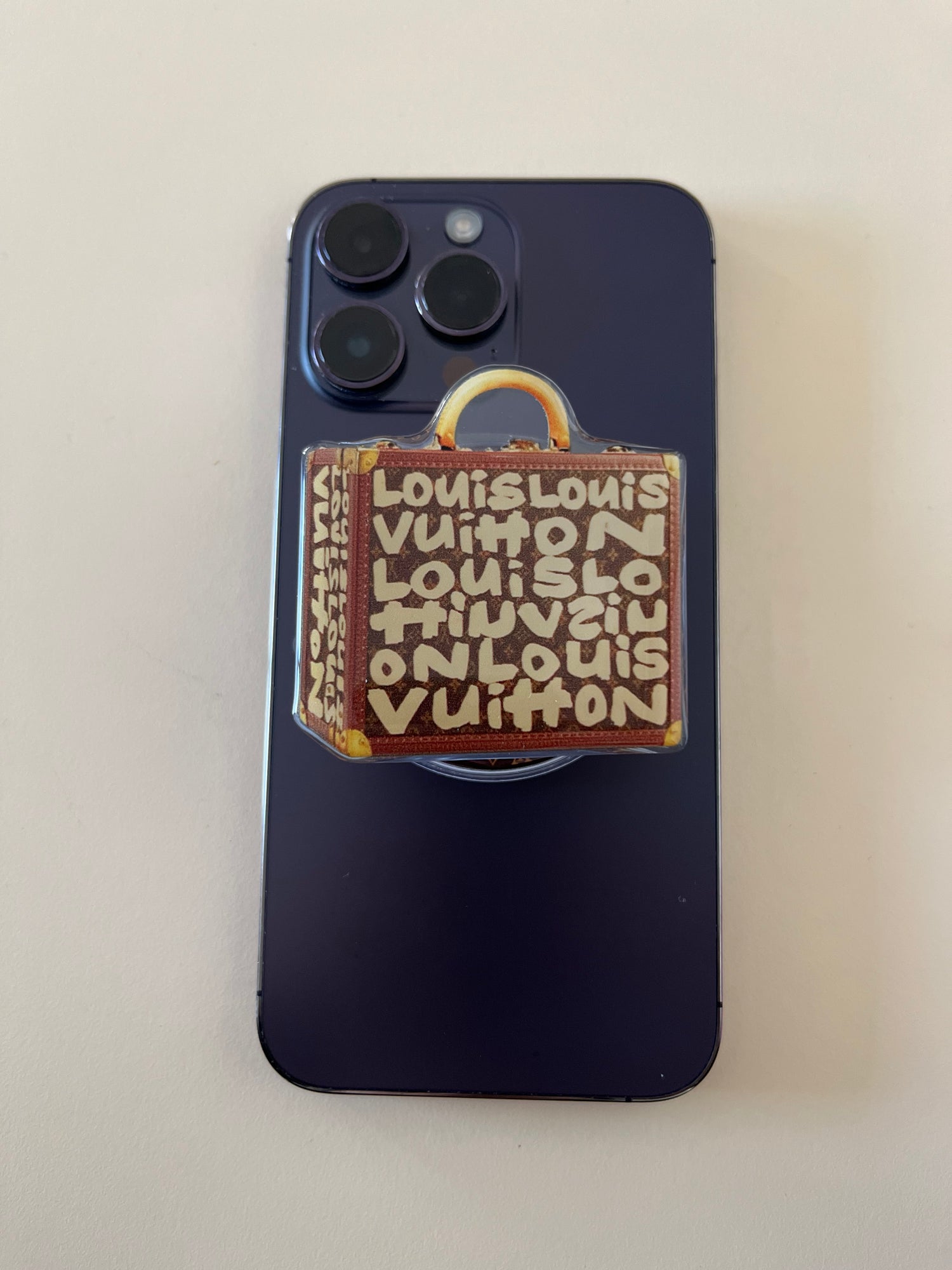Accessoire de téléphone valise Lv